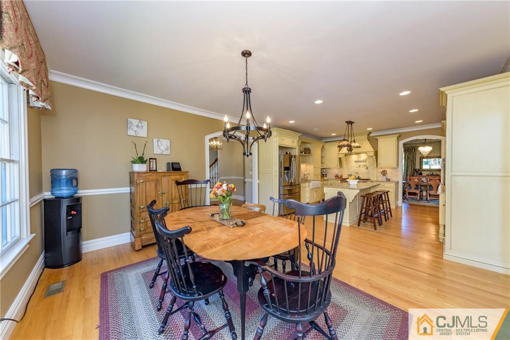40 Pickle Road Califon, NJ 07830 - Photo 17 of 50 a view of a dining room with furniture and wooden floor