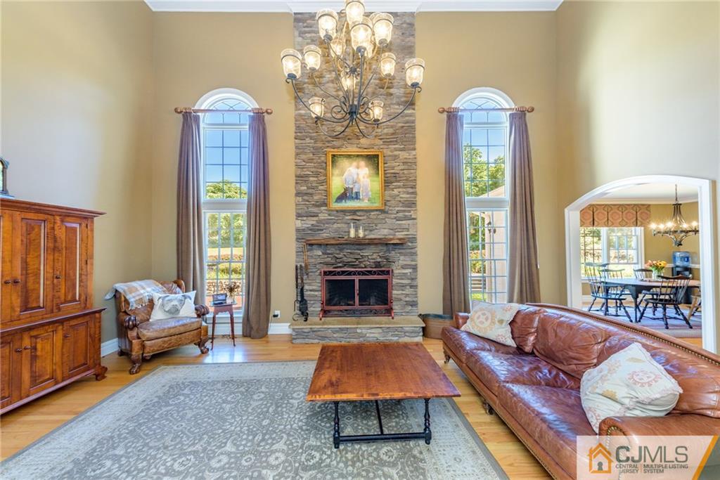 40 Pickle Road Califon, NJ 07830 - Photo 20 of 50 a living room with furniture and a fireplace
