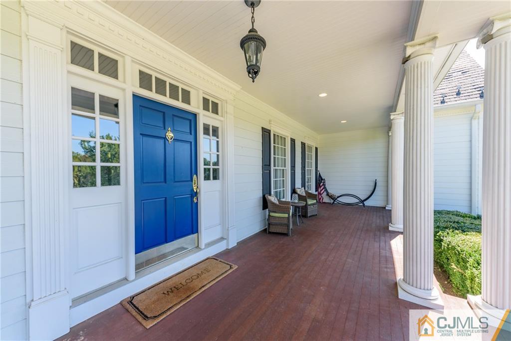 40 Pickle Road Califon, NJ 07830 - Photo 3 of 50 a very nice looking room with wooden floor and furniture