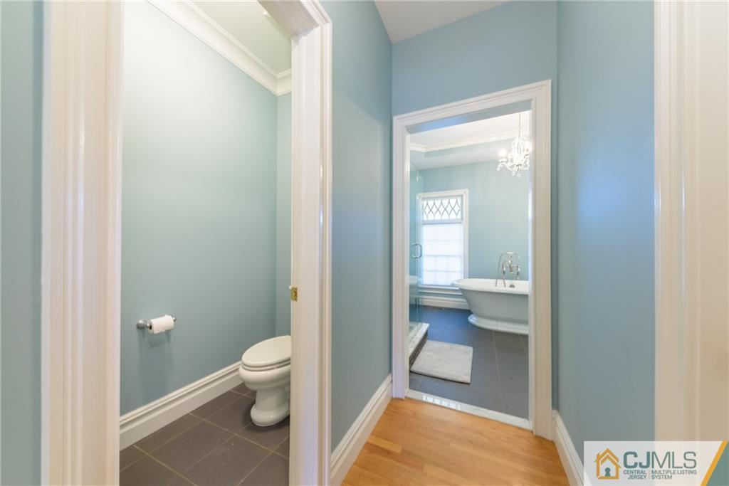 40 Pickle Road Califon, NJ 07830 - Photo 25 of 50 a bathroom with a toilet and a sink