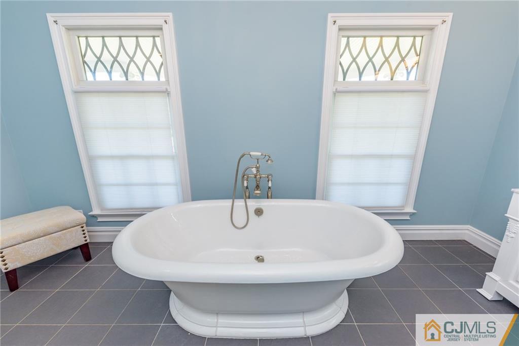 40 Pickle Road Califon, NJ 07830 - Photo 27 of 50 a bathroom with a sink and a window