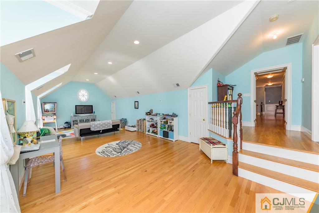 40 Pickle Road Califon, NJ 07830 - Photo 37 of 50 a bed room with a bed and a view of living room