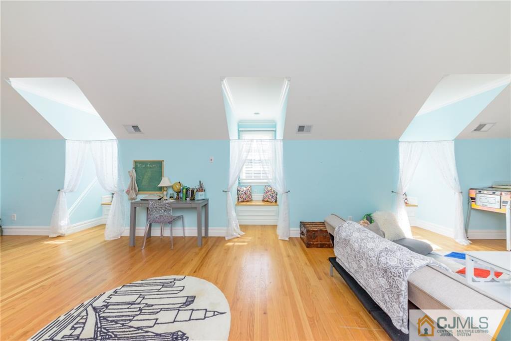 40 Pickle Road Califon, NJ 07830 - Photo 38 of 50 a living room with furniture and a wooden floor