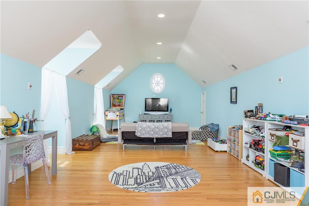40 Pickle Road Califon, NJ 07830 - Photo 39 of 50 a living room with furniture and a wooden floor