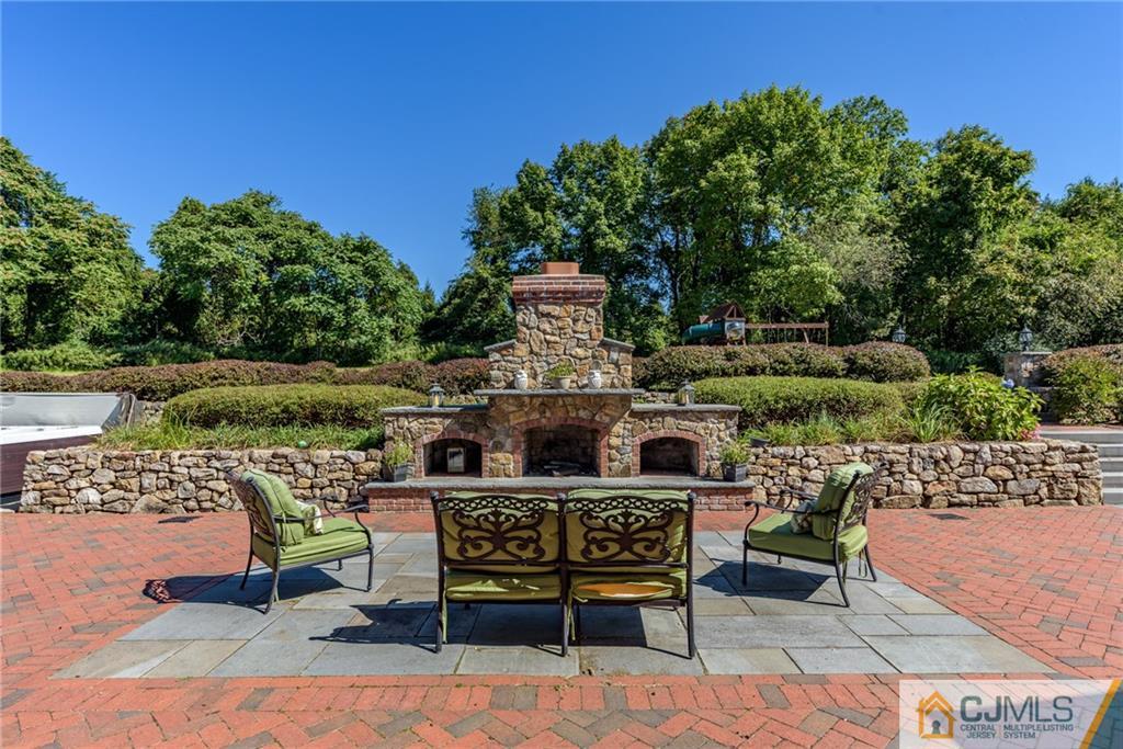 40 Pickle Road Califon, NJ 07830 - Photo 42 of 50 a view of a chairs and table in a patio