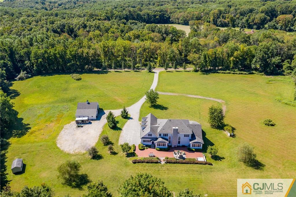 40 Pickle Road Califon, NJ 07830 - Photo 47 of 50 an aerial view of a house with a swimming pool