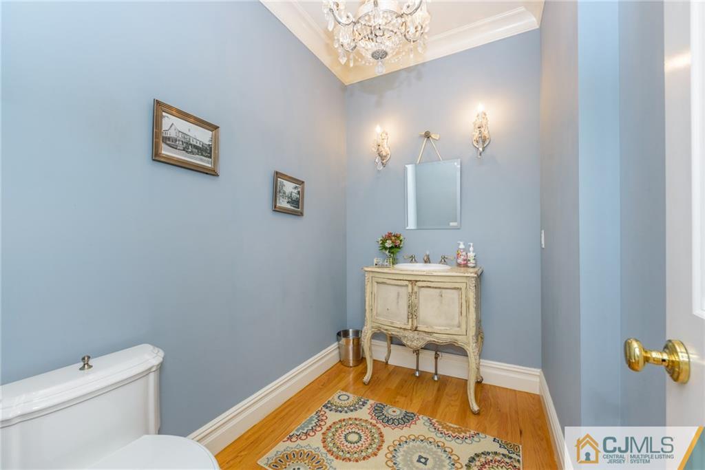 40 Pickle Road Califon, NJ 07830 - Photo 8 of 50 a bathroom with a sink mirror and toilet