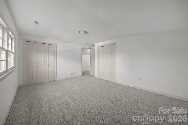 an empty room with windows