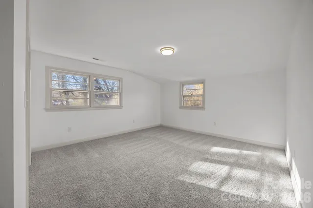 a front view of a house with yard