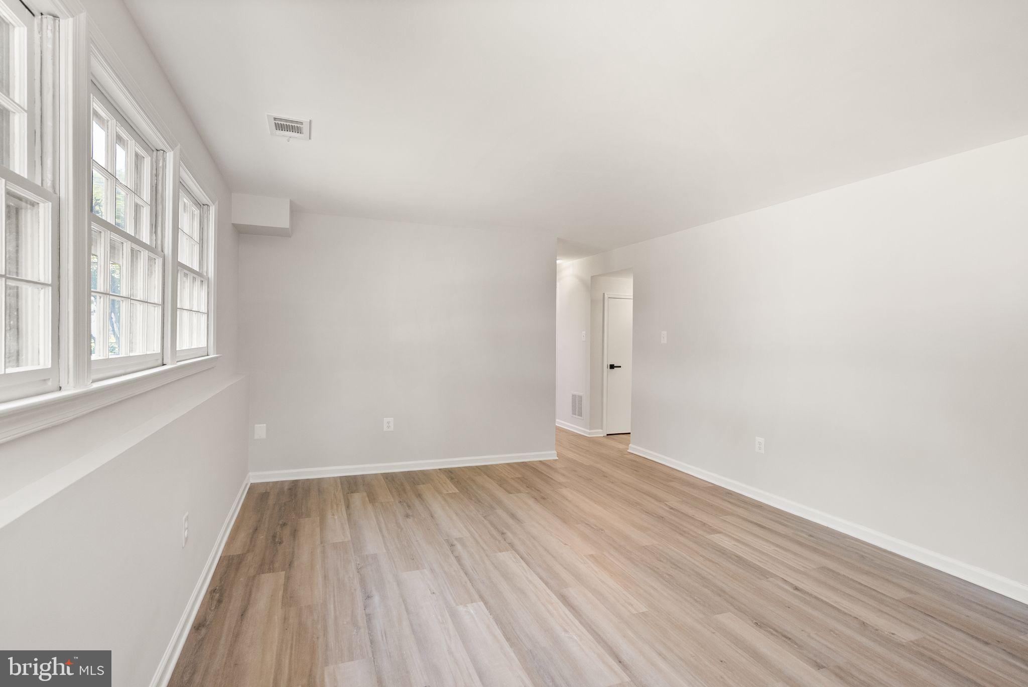 8803 Hayload Court Springfield, VA 22153 - Photo 34 of 49 Lower Level Rec Room w/ Wood Burning Fireplace