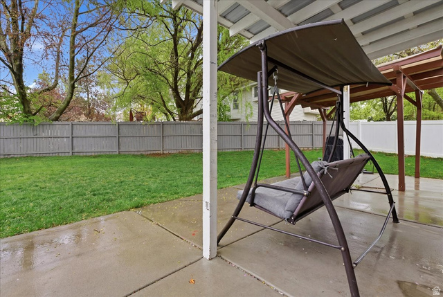 7975 Showcase Lane Sandy, UT 84094 - Photo 27 of 29 Fenced backyard offer privacy and multiple covered areas
