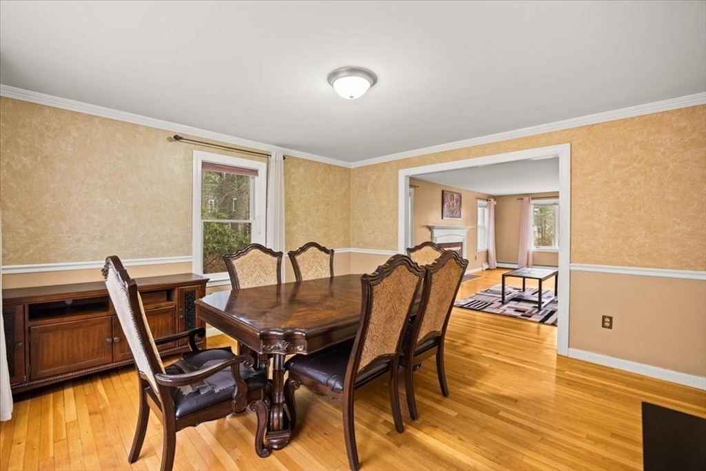 211 Cherry Street Bridgewater, MA 02324 - Photo 11 of 39 a view of a dining room with furniture and wooden floor