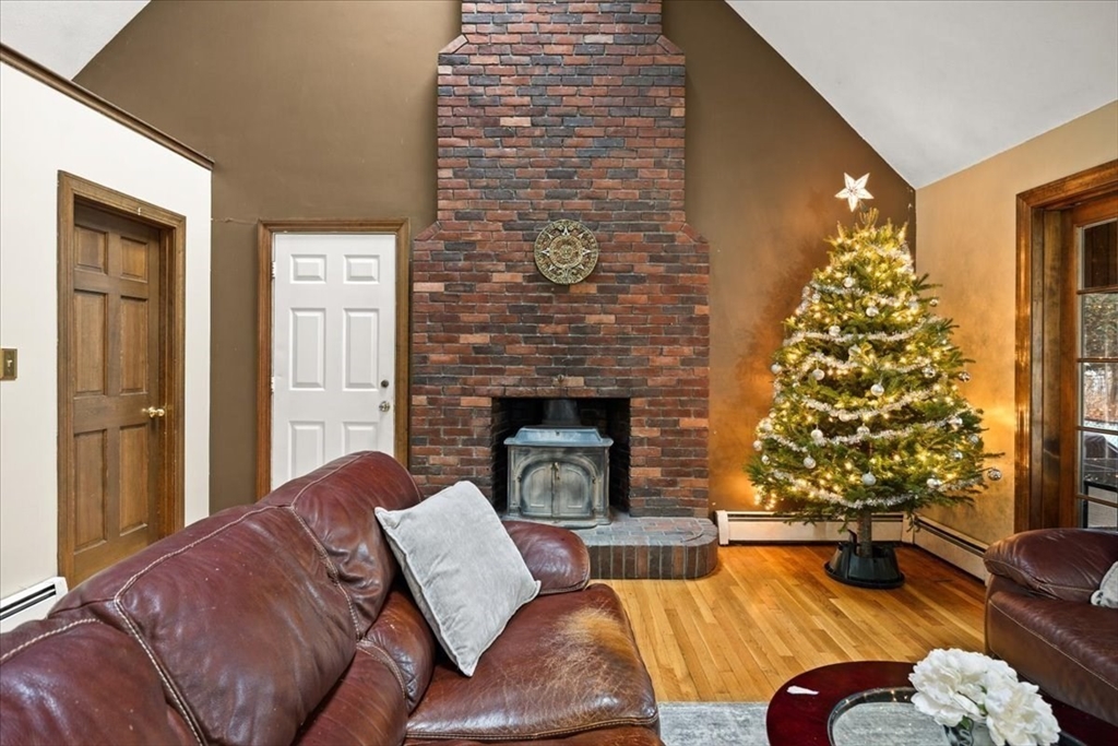 211 Cherry Street Bridgewater, MA 02324 - Photo 14 of 39 a living room with furniture and a fireplace