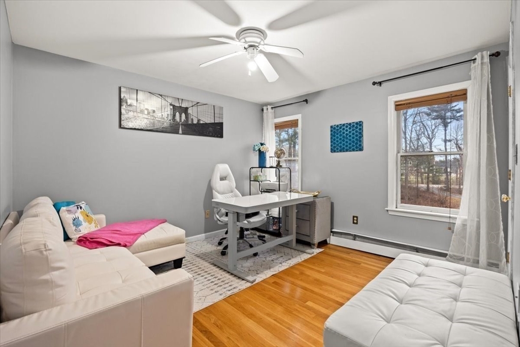 211 Cherry Street Bridgewater, MA 02324 - Photo 18 of 39 a bedroom with a bed and a table in it