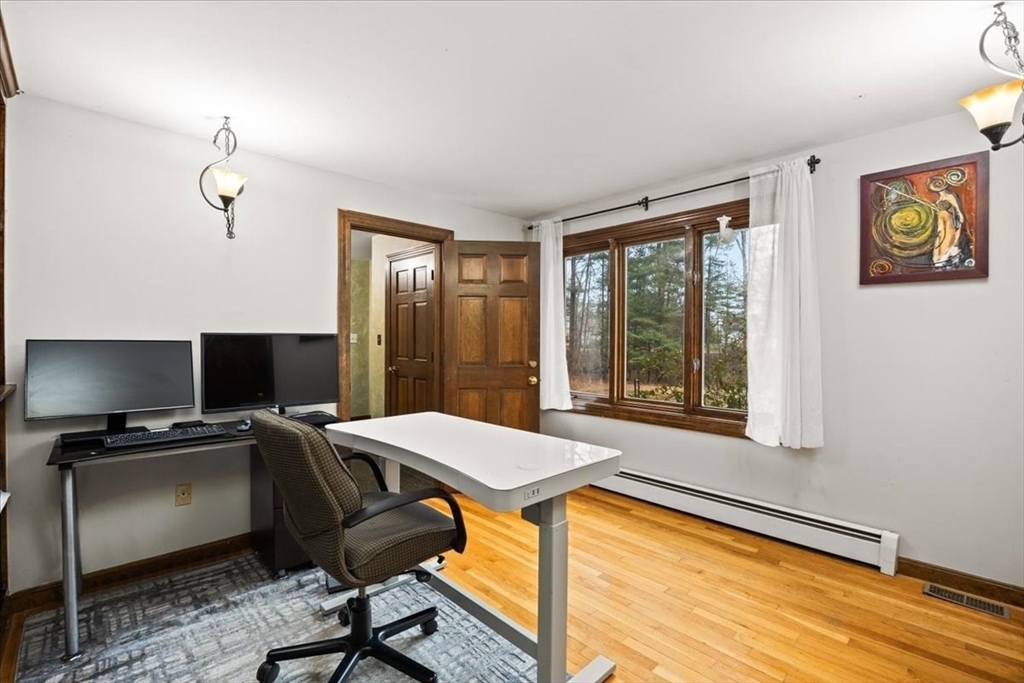 211 Cherry Street Bridgewater, MA 02324 - Photo 22 of 39 a view of a workspace with furniture and a window
