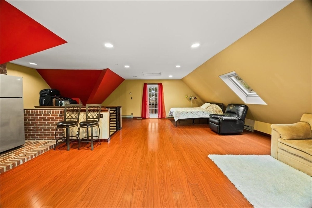 211 Cherry Street Bridgewater, MA 02324 - Photo 24 of 39 a view of a kitchen with a table and chairs