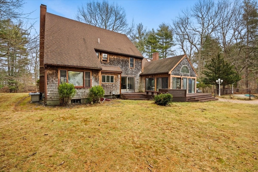 211 Cherry Street Bridgewater, MA 02324 - Photo 28 of 39 a front view of a house with a yard