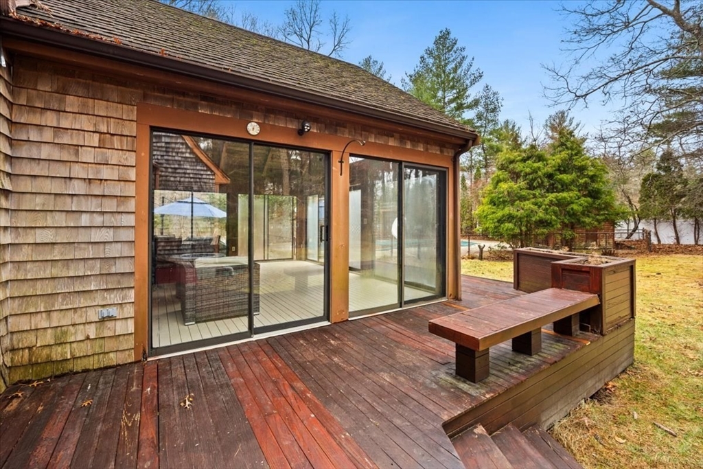 211 Cherry Street Bridgewater, MA 02324 - Photo 30 of 39 a roof deck with wooden floor and fence