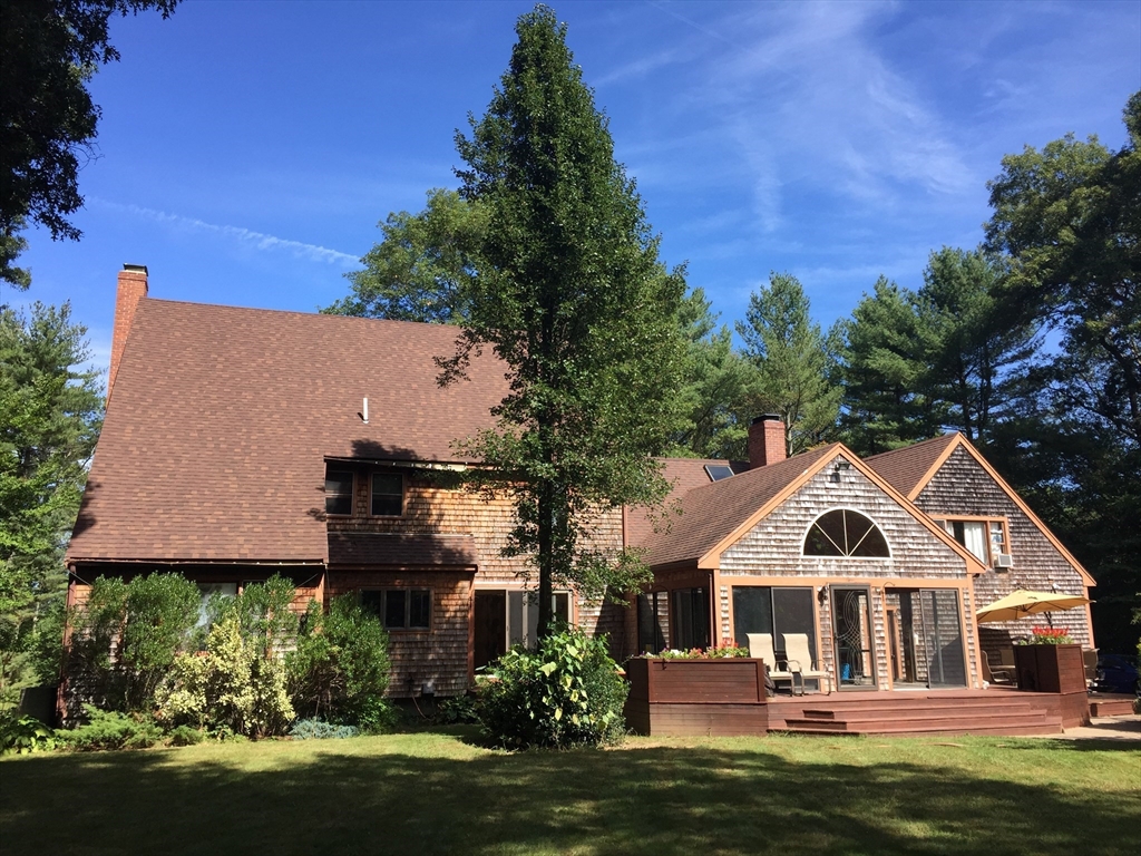 211 Cherry Street Bridgewater, MA 02324 - Photo 33 of 39 a front view of a house with a garden