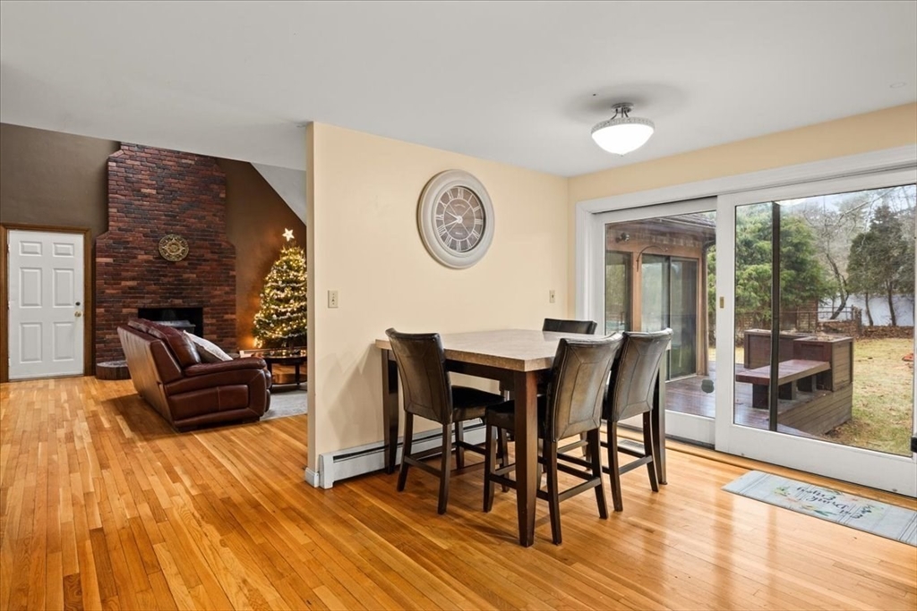 211 Cherry Street Bridgewater, MA 02324 - Photo 8 of 39 a view of a dining room with furniture window and wooden floor
