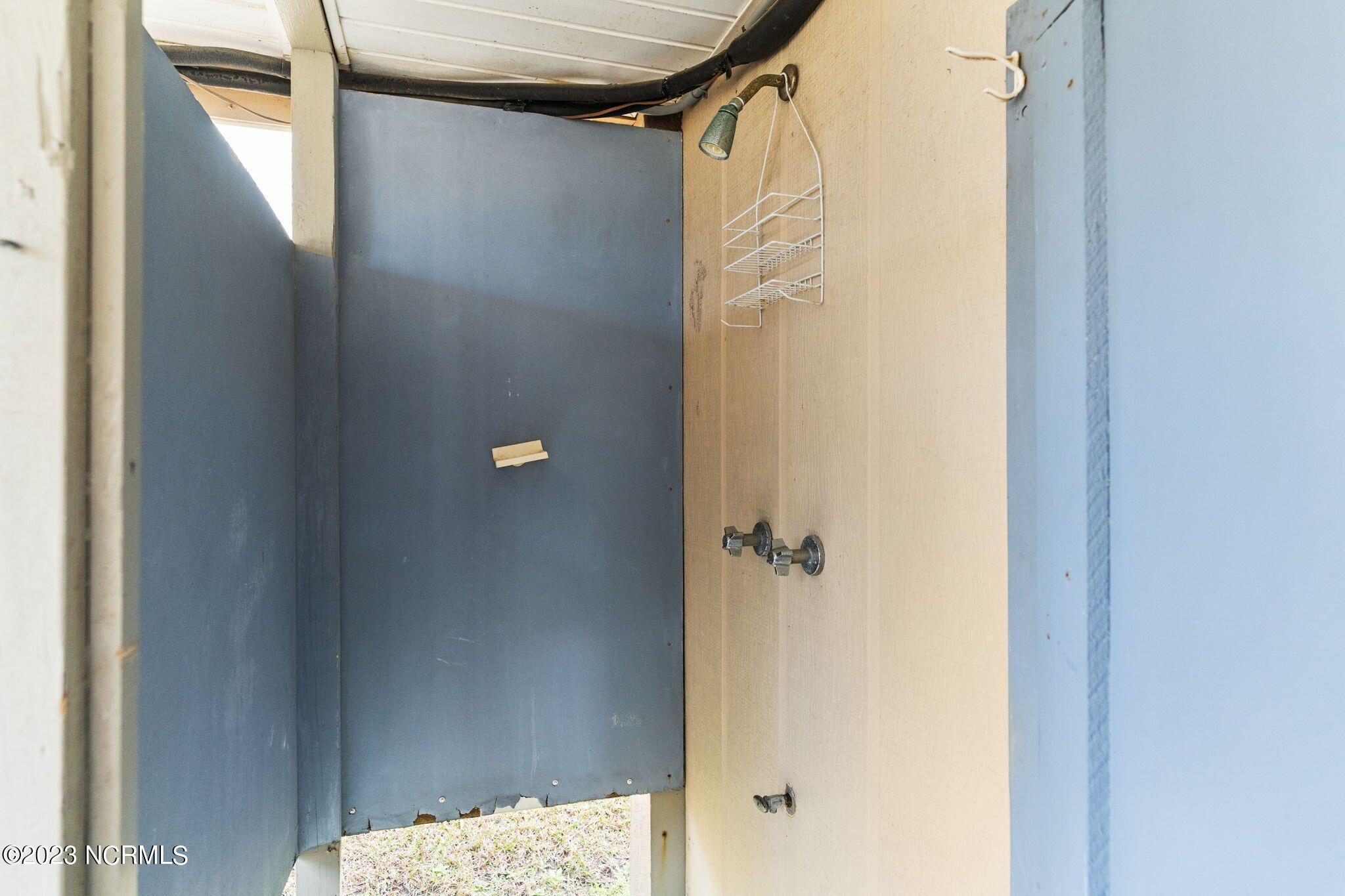 438 3rd Street Sunset Beach, NC 28468 - Photo 55 of 77 Two outside showers.