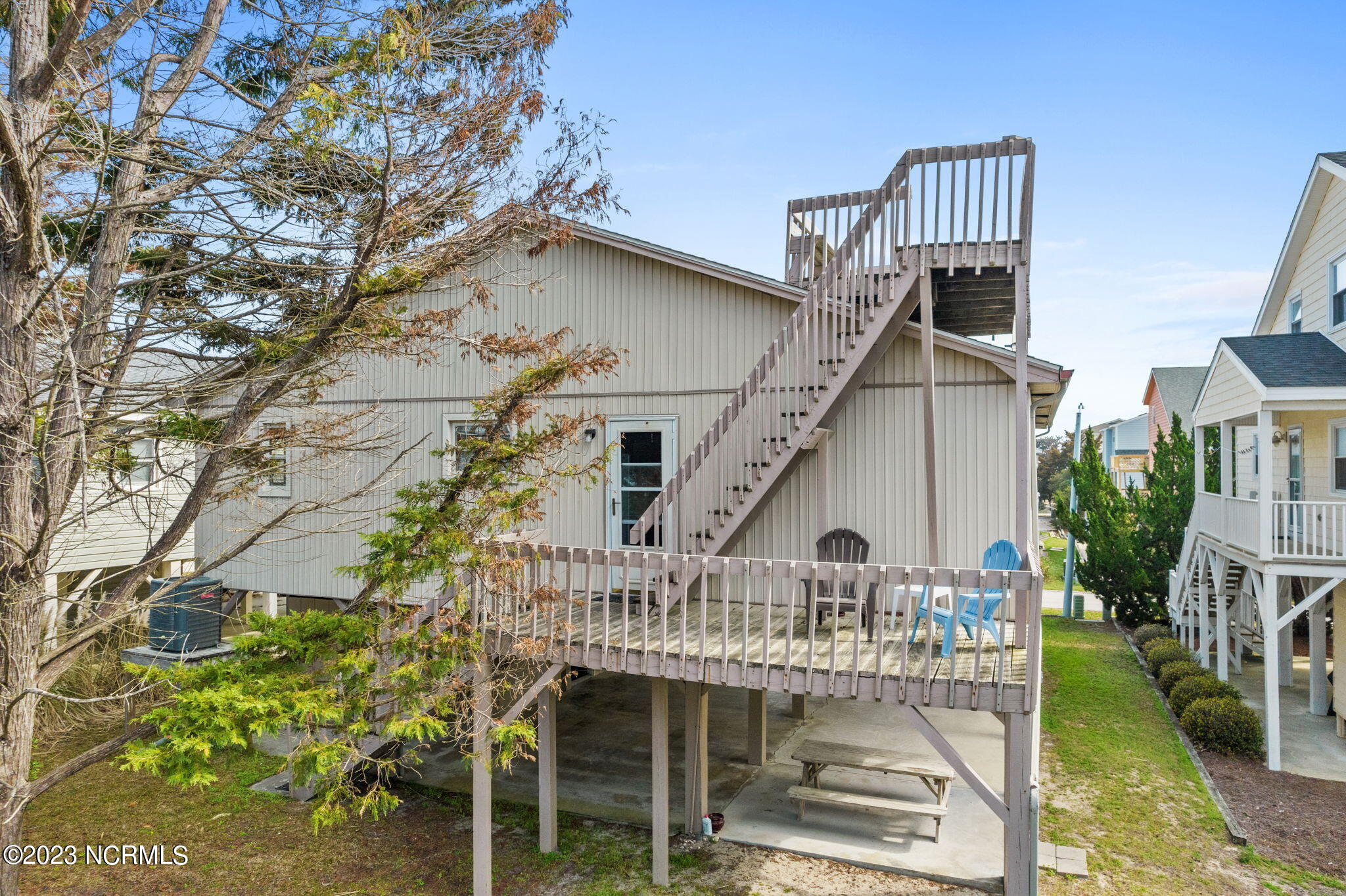 438 3rd Street Sunset Beach, NC 28468 - Photo 7 of 77 Access to upper deck.