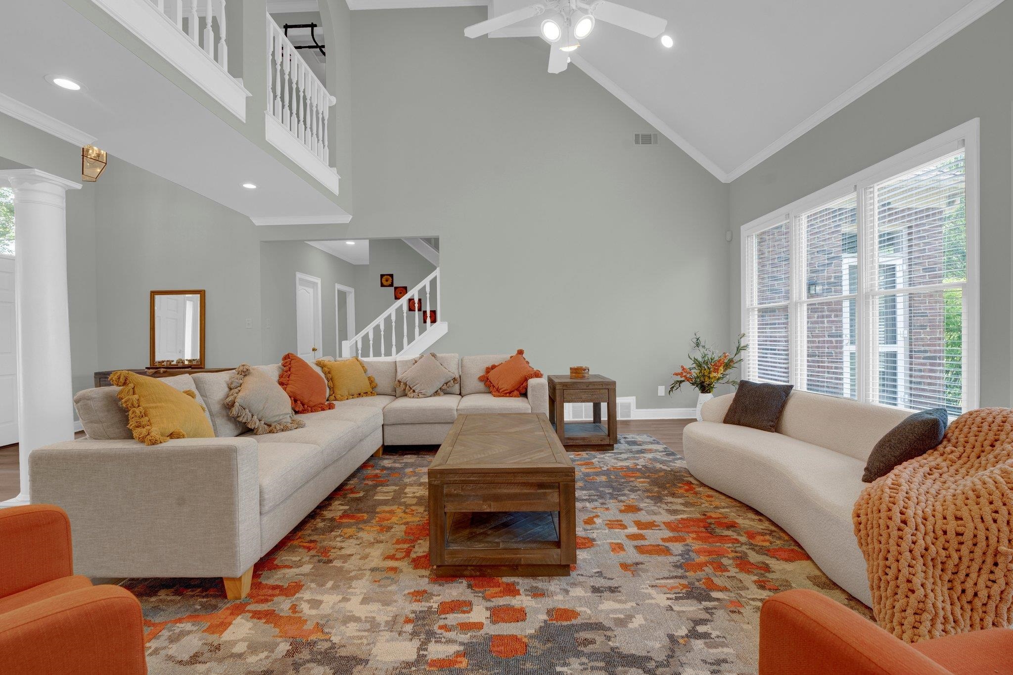 1331 Riding Brook Drive Collierville, TN 38017 - Photo 2 of 39 Living room with dark hardwood / wood-style flooring, a wealth of natural light, ceiling fan, and high vaulted ceiling