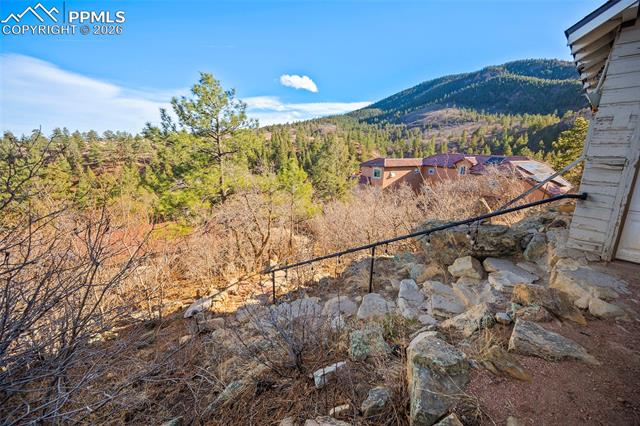 465 Gold Camp Road Colorado Springs, CO 80906 - Photo 31 of 44 Stairwell to residence