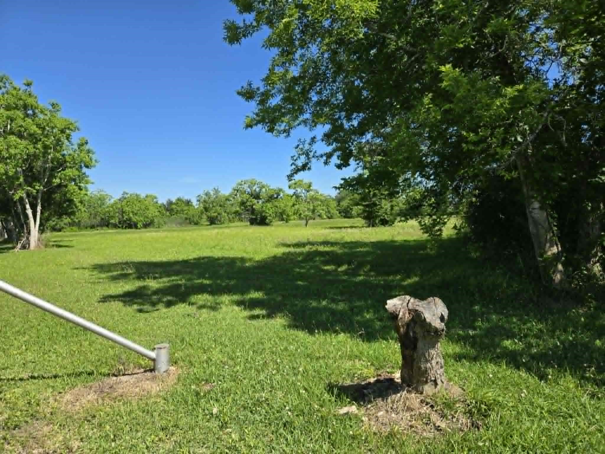 1115 Delany Road La Marque, TX 77568 - Photo 4 of 7 Front Right (pond is straight a head)
