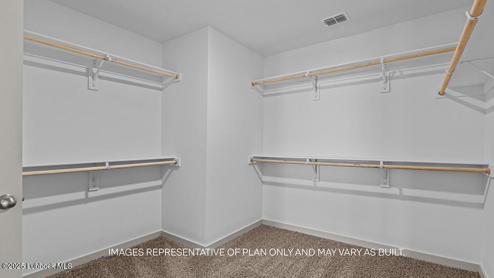 7429 9th Street Lubbock, TX 79416 - Photo 10 of 16 a view of an empty walk in closet