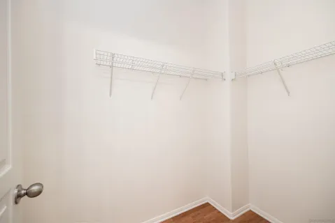a view of a room with racks on the wall