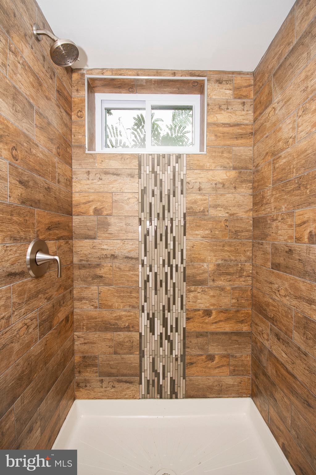 7412 Prince George Road Baltimore, MD 21208 - Photo 17 of 22 a bathroom with a shower