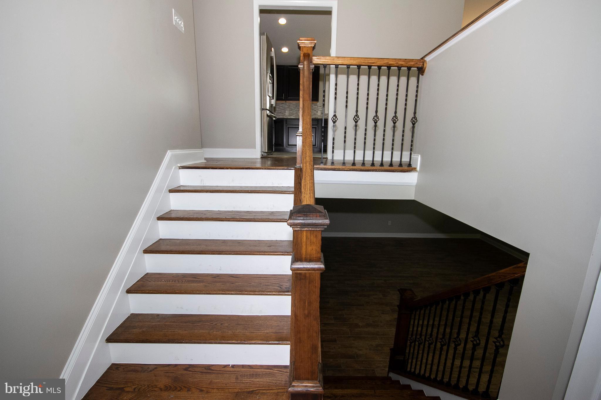 7412 Prince George Road Baltimore, MD 21208 - Photo 18 of 22 a view of entryway and hall with wooden floor