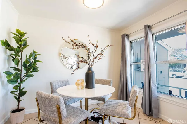 a kitchen with stainless steel appliances granite countertop a stove sink and cabinets