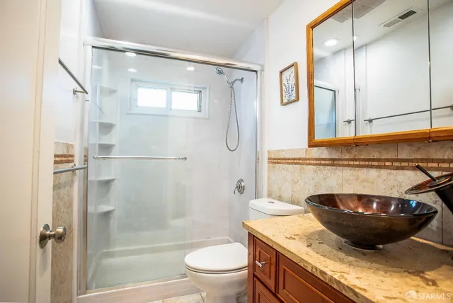 a backyard of a house with seating space