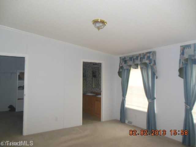 1141 Broadrock Road Snow Camp, NC 27349 - Photo 4 of 13 Master Bedroom.