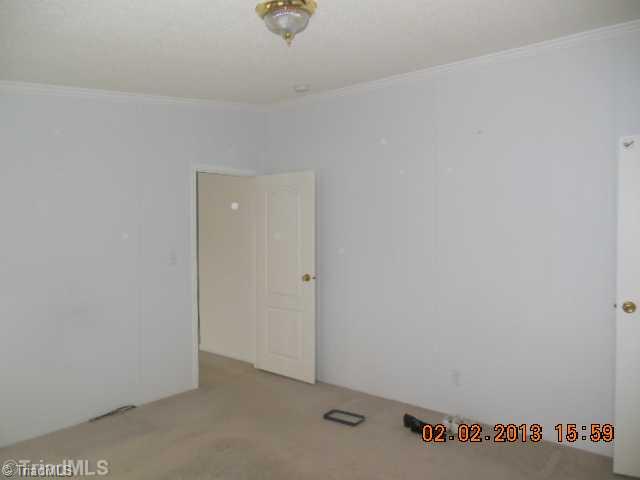 1141 Broadrock Road Snow Camp, NC 27349 - Photo 5 of 13 Master Bedroom.