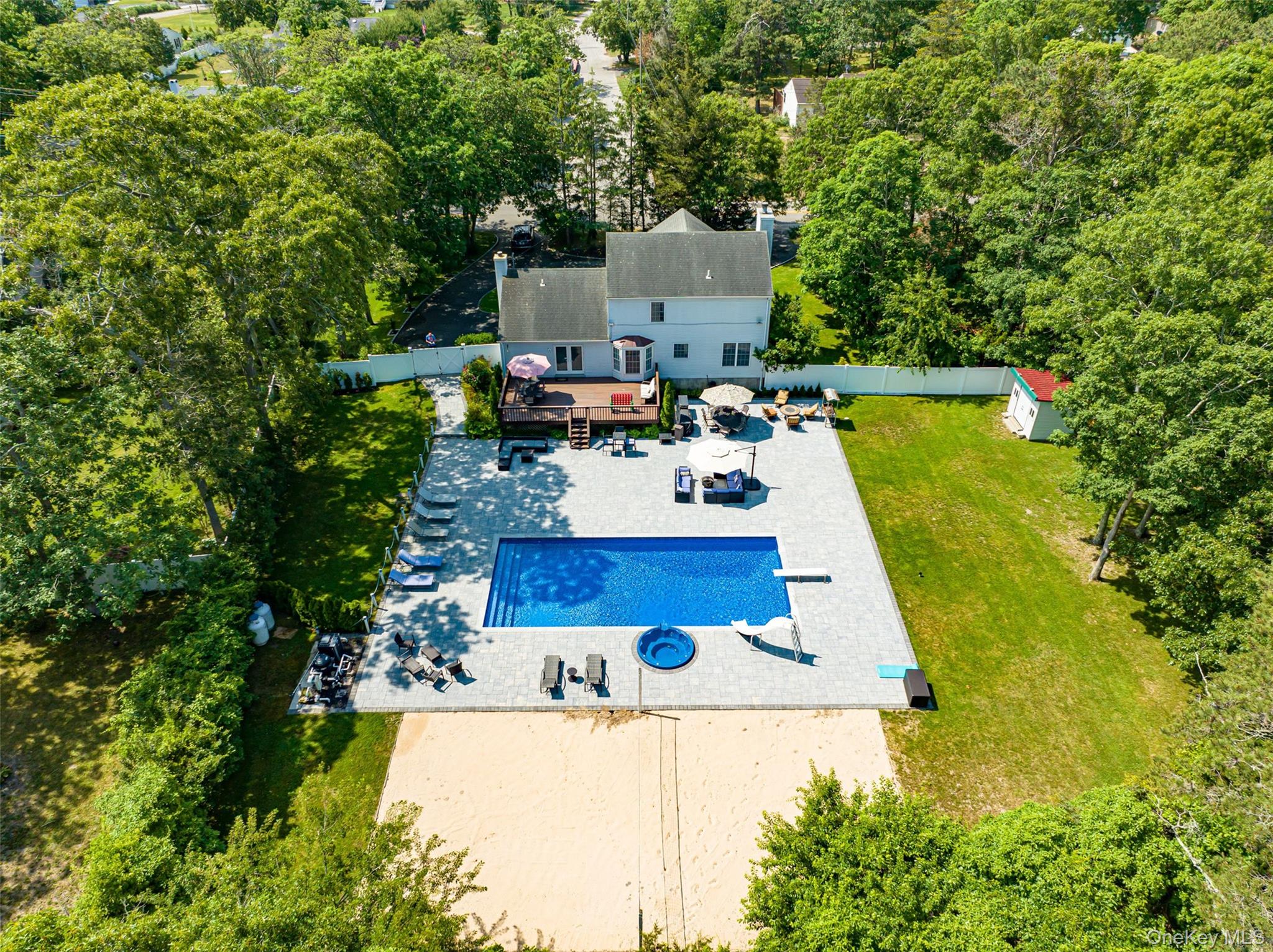 63 East Tiana Road Hampton Bays, NY 11946 - Photo 25 of 30 a view of house with outdoor space
