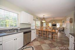63 East Tiana Road Hampton Bays, NY 11946 - Photo 10 of 30 a kitchen with lots of counter top space