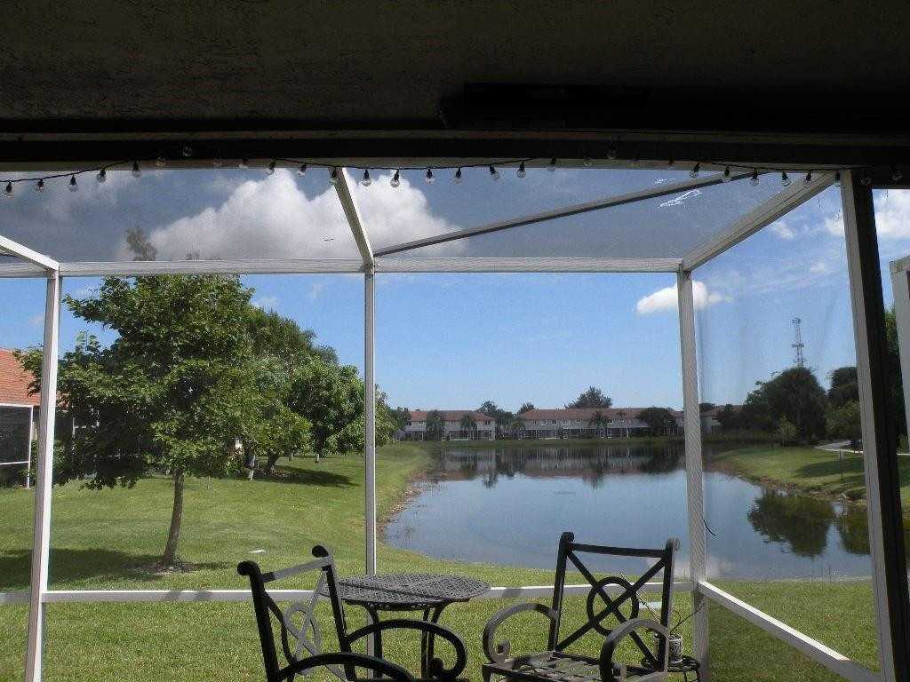 21116 Vía Solano Boca Raton, FL 33433 - Photo 34 of 39 VIEW OF WIDE LAKE FROM PATIO