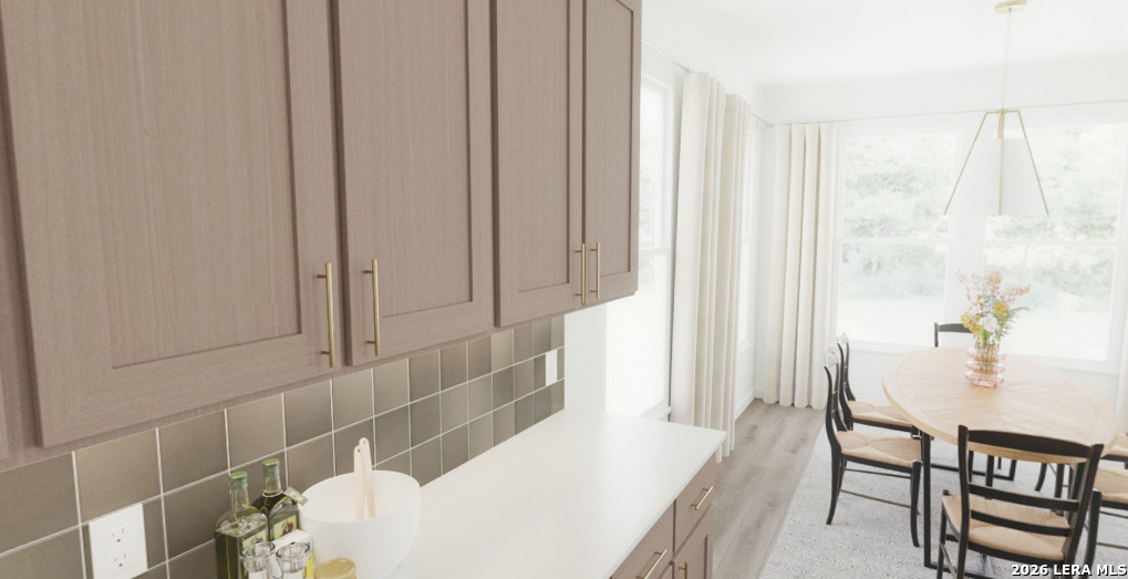 411 Nottabi Road Adkins, TX 78101 - Photo 5 of 8 a living room with furniture and a window