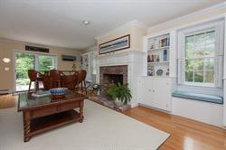 608 Old Post Road Cotuit, MA 02635 - Photo 14 of 30 a living room with furniture and a fireplace