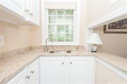 608 Old Post Road Cotuit, MA 02635 - Photo 17 of 30 a bathroom with a sink and a window