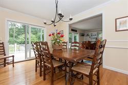 608 Old Post Road Cotuit, MA 02635 - Photo 4 of 30 a view of a dining room with furniture window and wooden floor