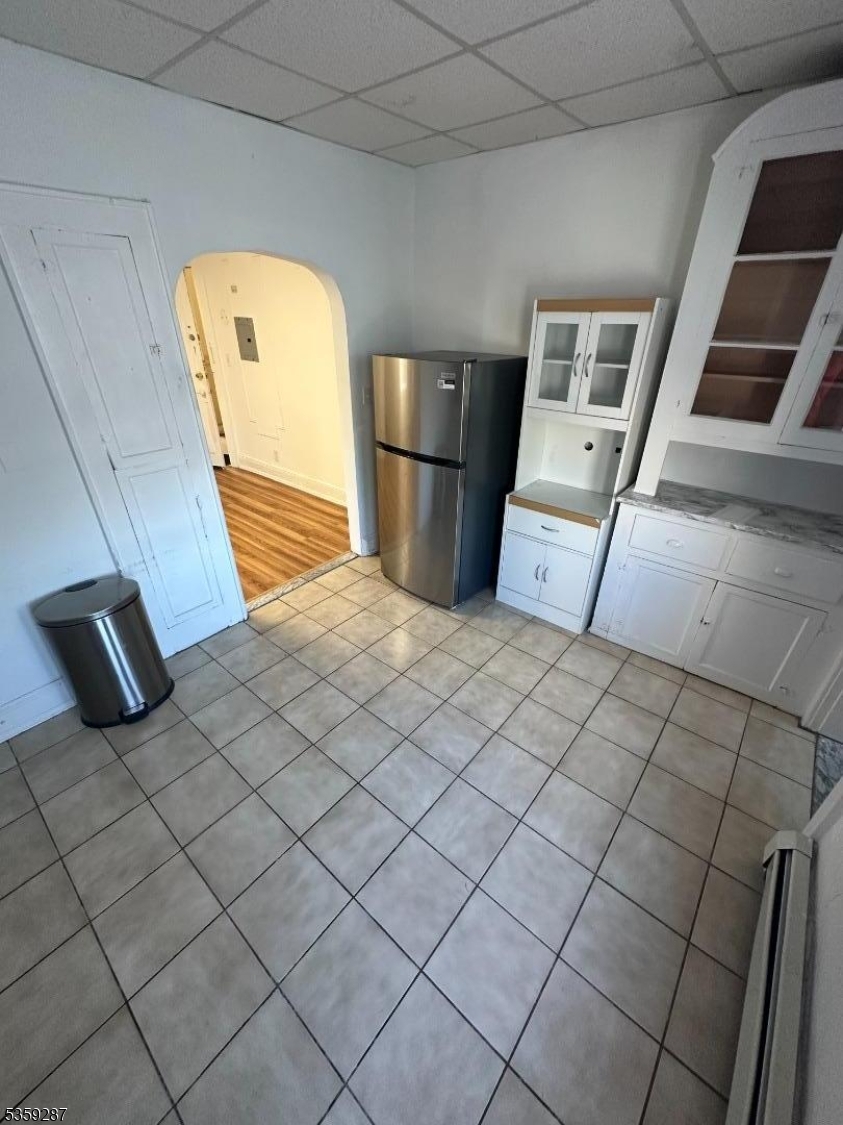 1153 Main Avenue Clifton, NJ 07011 - Photo 5 of 6 a view of a livingroom with a couch