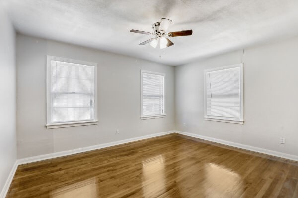 607 West N Loop Boulevard Austin, TX 78751 - Photo 9 of 11 a view of an empty room with a window