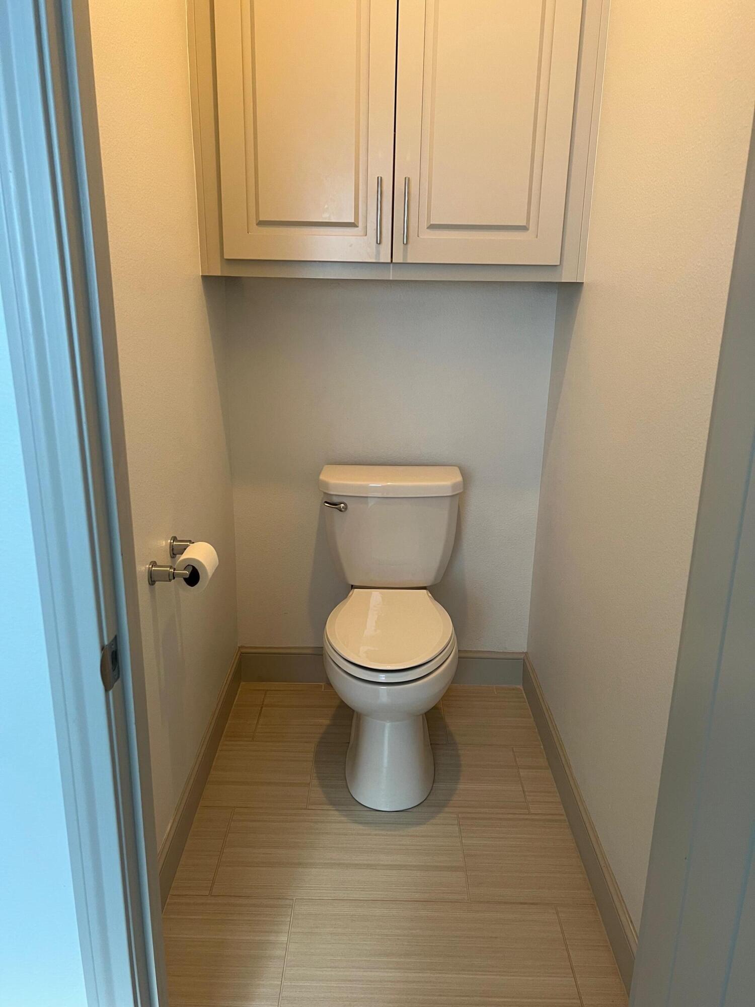 5615 115th Street Lubbock, TX 79424 - Photo 16 of 31 a bathroom with a toilet