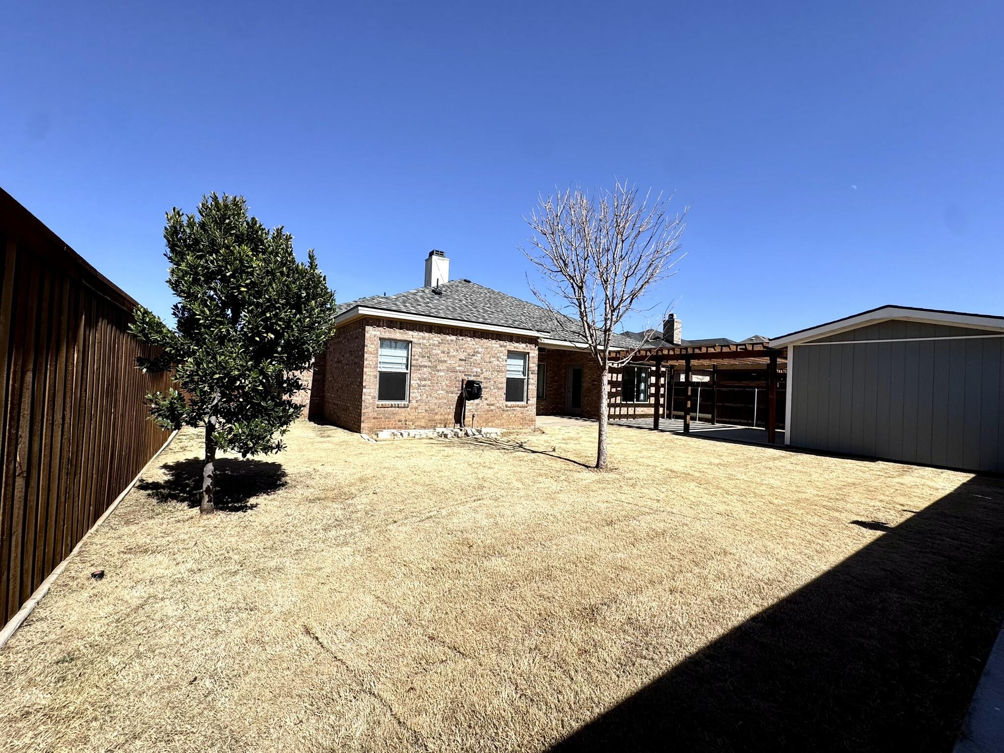 5615 115th Street Lubbock, TX 79424 - Photo 30 of 31 a house view with a outdoor space