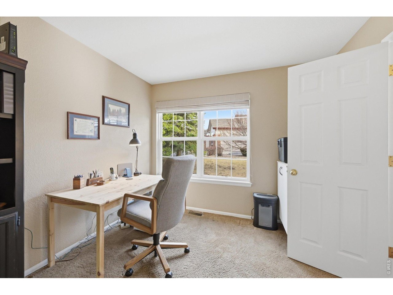 6227 Secrest Lane Arvada, CO 80403 - Photo 11 of 47 a workspace with furniture and a window