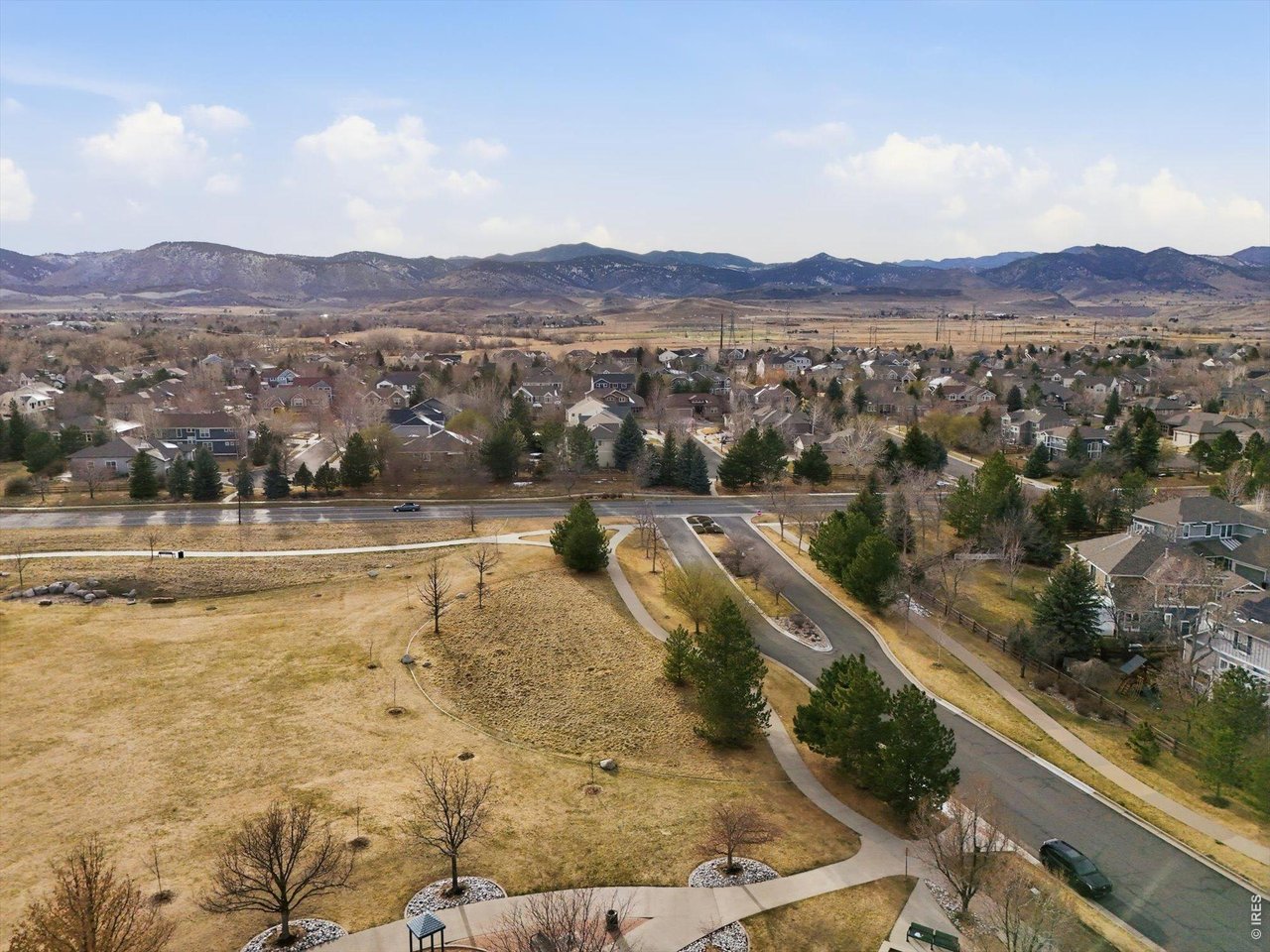 6227 Secrest Lane Arvada, CO 80403 - Photo 40 of 47 a view of a swimming pool with mountains in the background